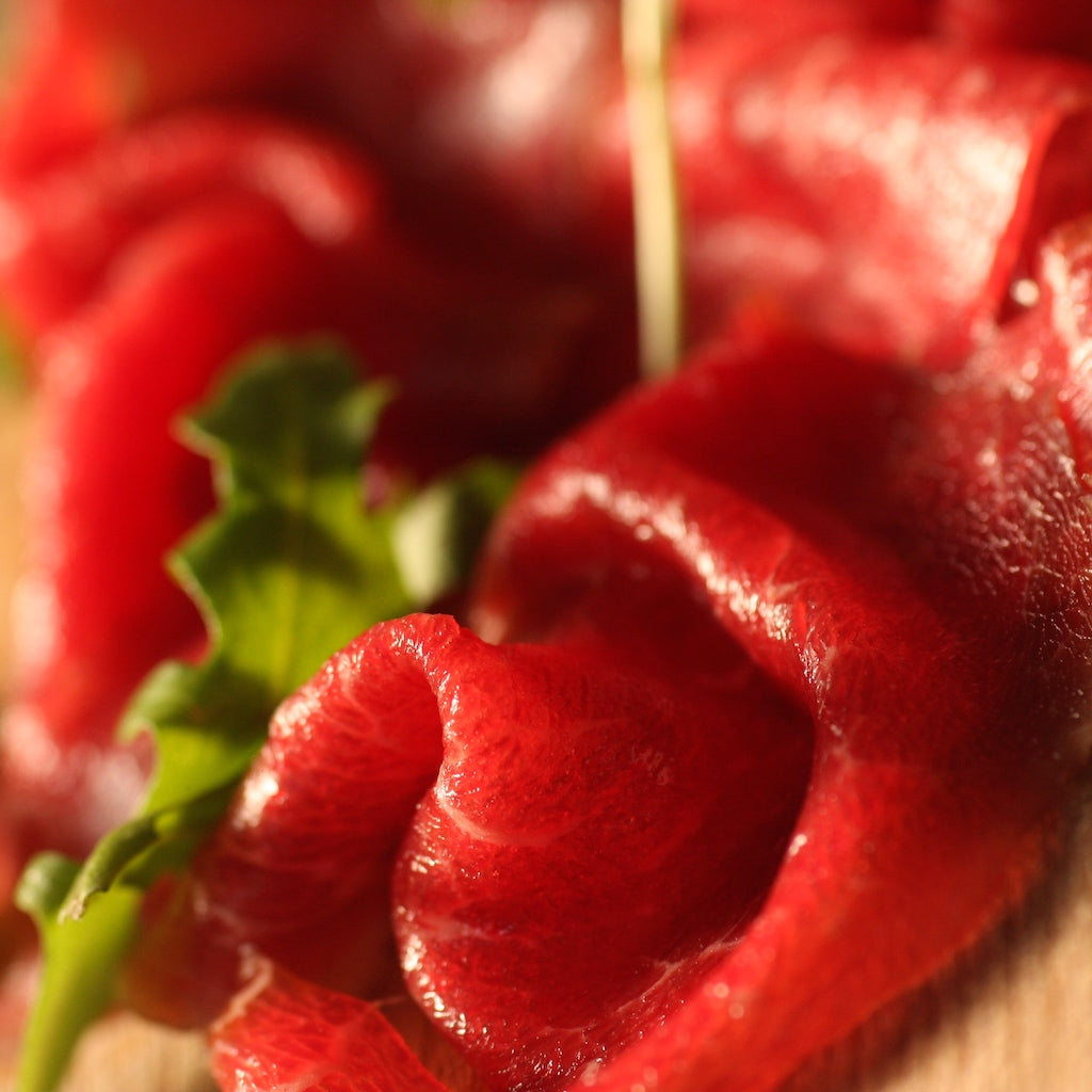 The Artisan Smokehouse's smoked beef fillet served with rocket