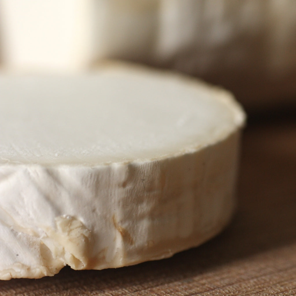 A piece of The Artisan Smokehouse's smoked goats cheese