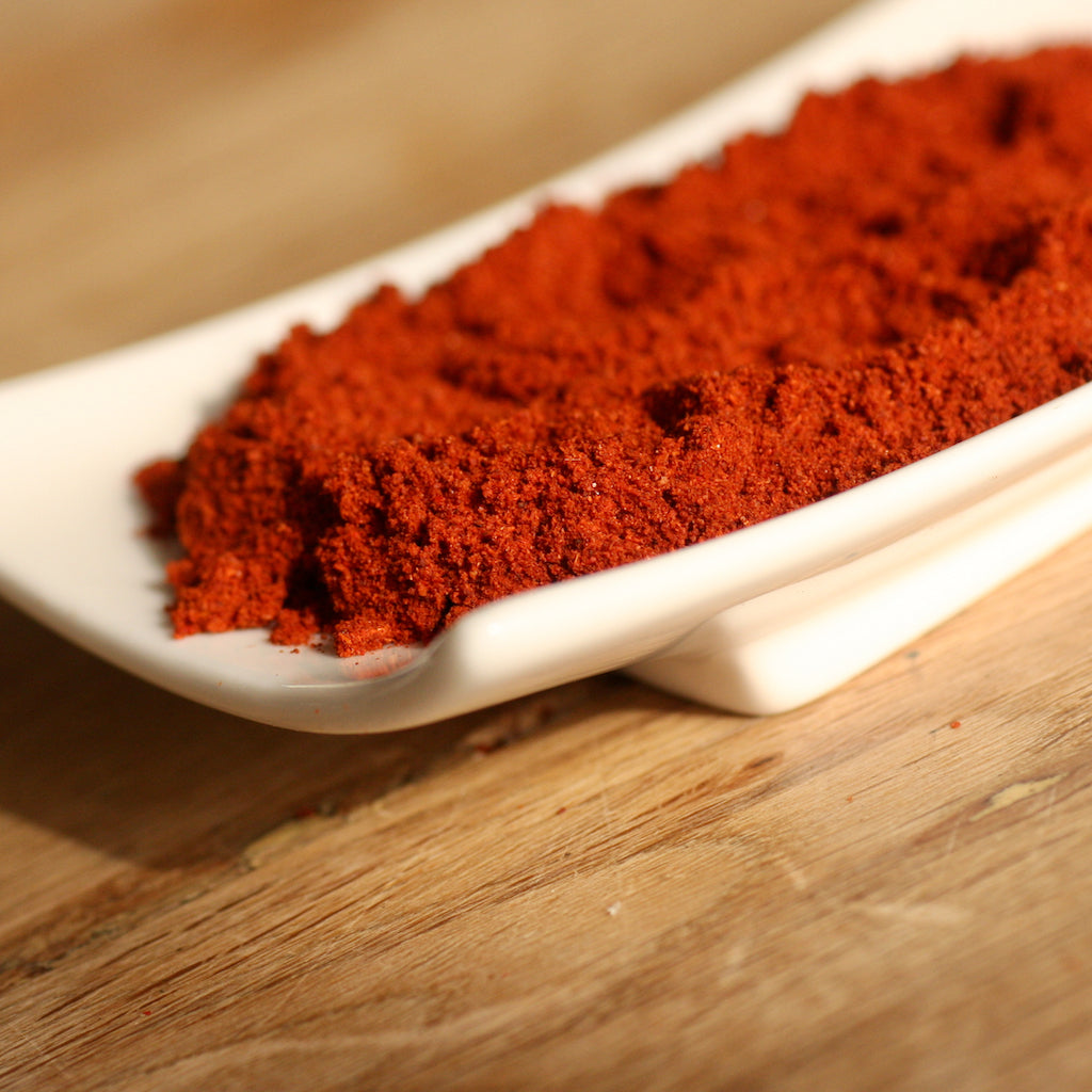 The Artisan Smokehouse's smoked paprika in ramekin on board